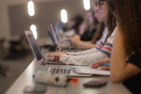 Students at their computer accessing digital content